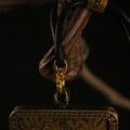The Black Jambhala Amulet: Hand-Painted Tibetan God of Wealth Pendant (Silver-Clad Copper) - Image 3